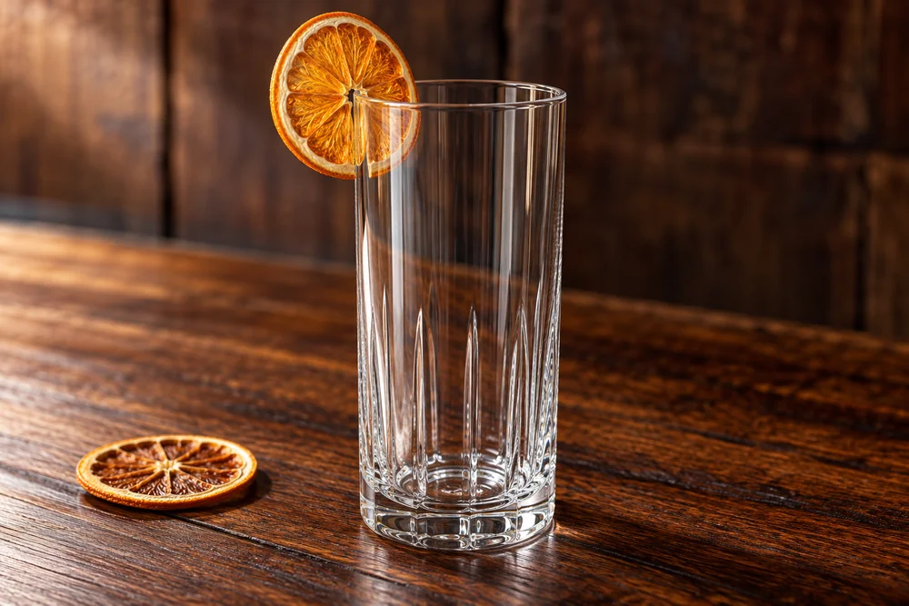 Black Jack Samui · Garnish on a wooden bar
