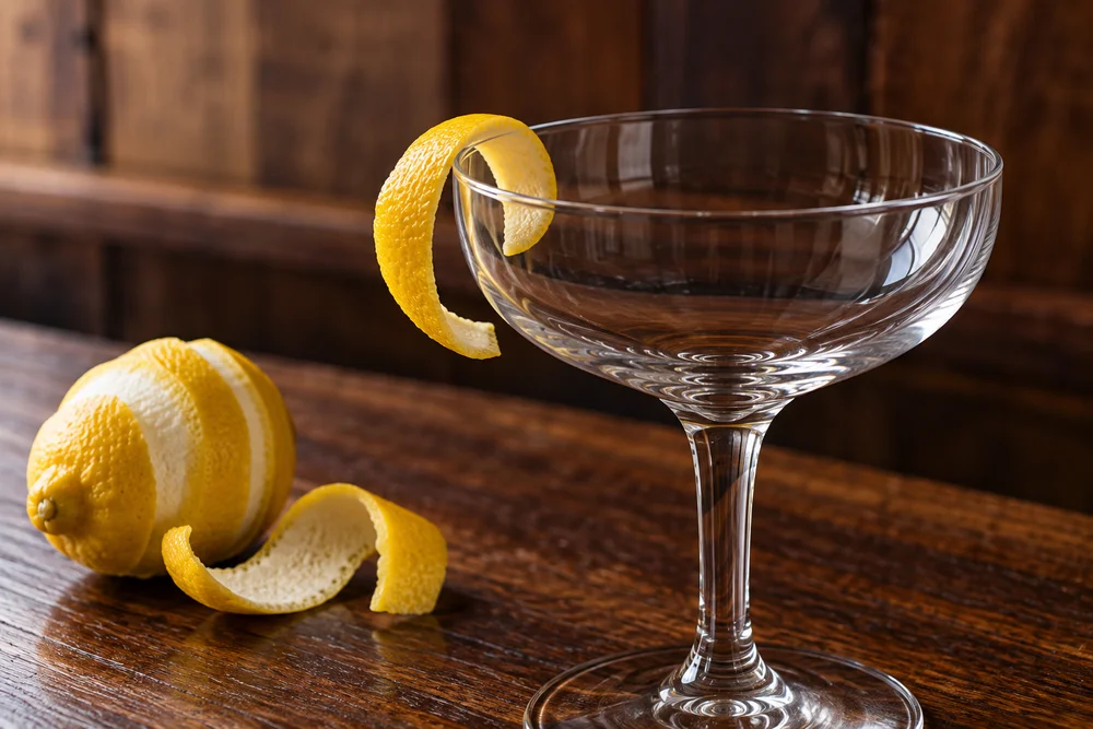 Rusty Nail · Garnish on a wooden bar