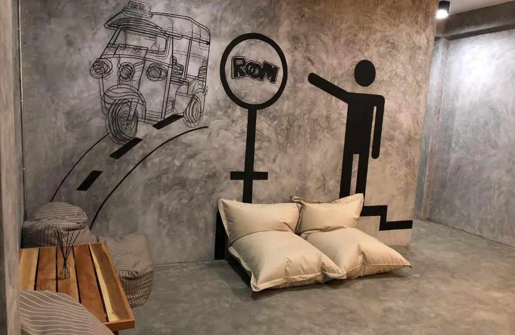 Lounge seating with original tuk-tuk wall art