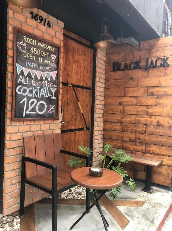 Blackjack entrance with chalkboard and outdoor seating